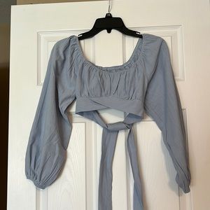 Brand new long sleeve blue cropped blouse